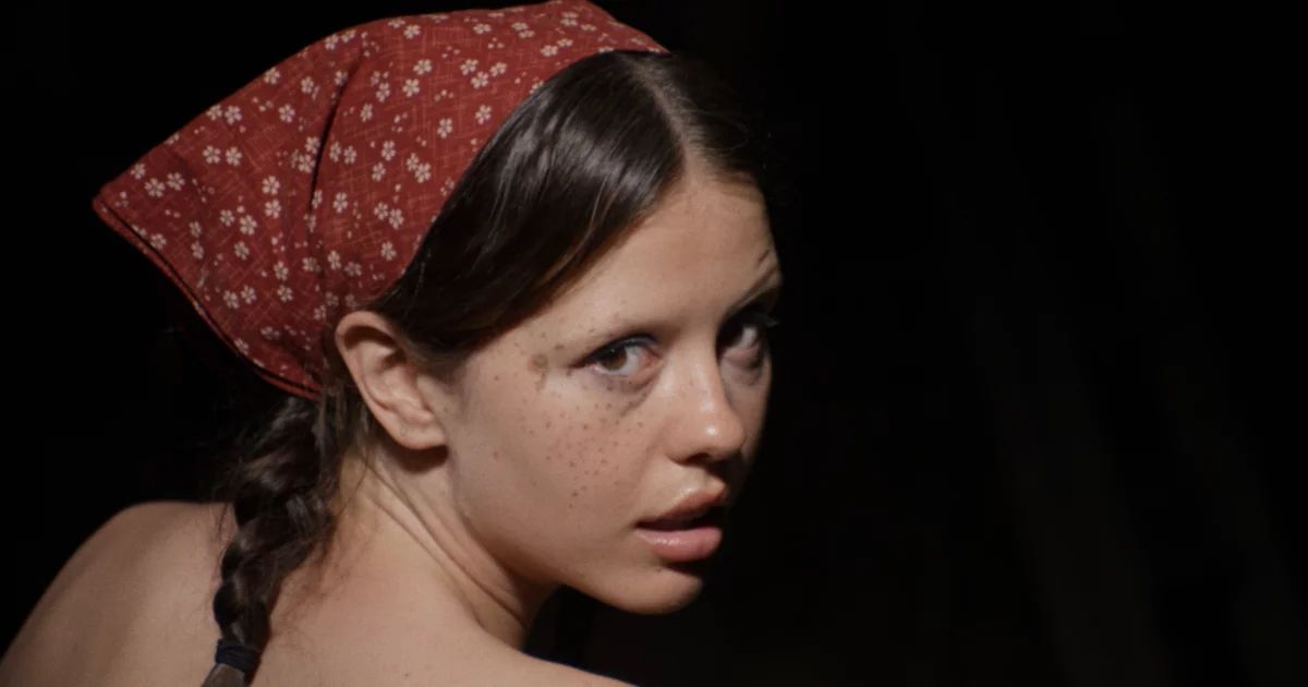 Mia Goth in a bandana turns her head around in X