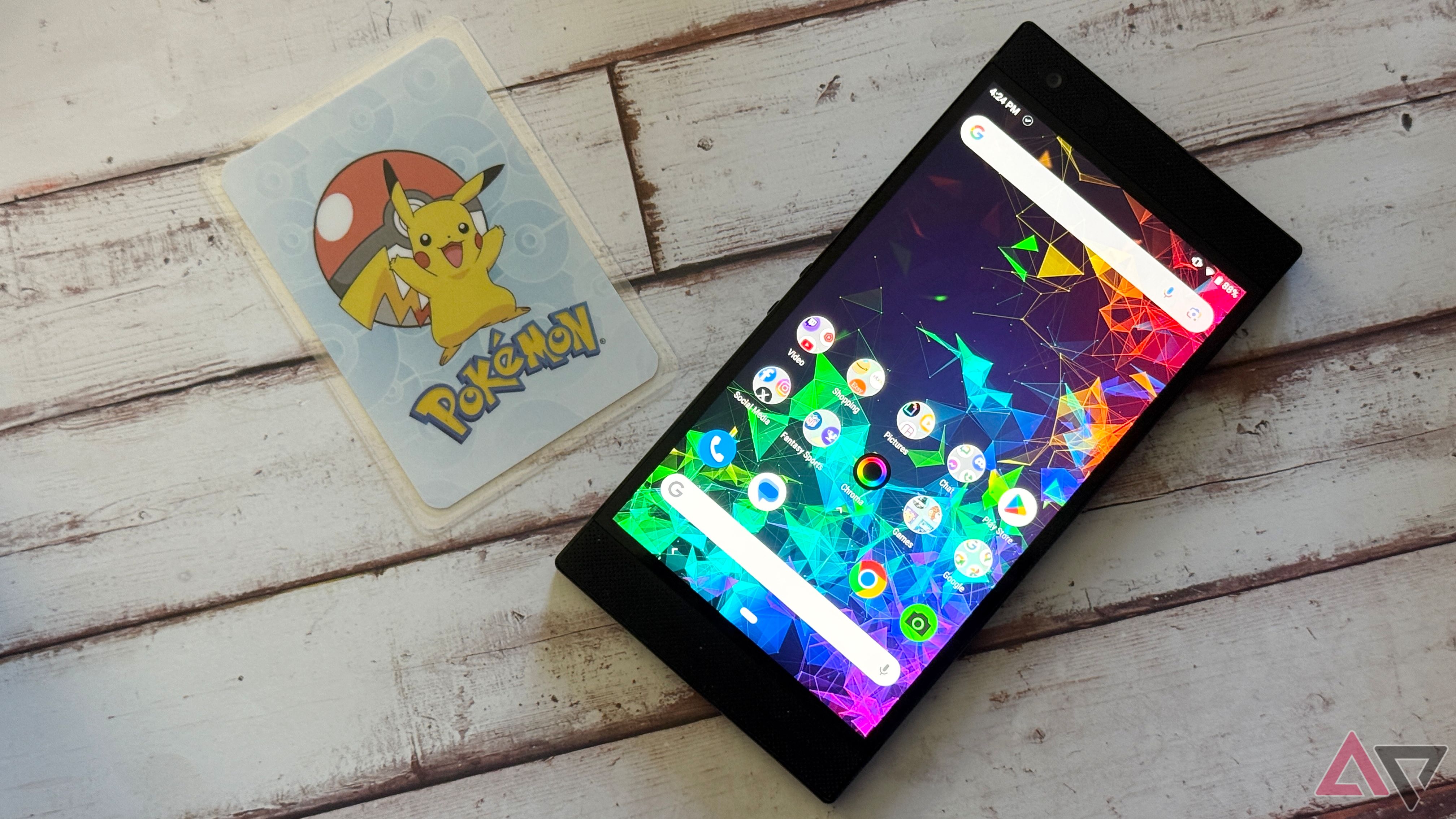 Razer Phone 2 sitting next to a Pokemon card