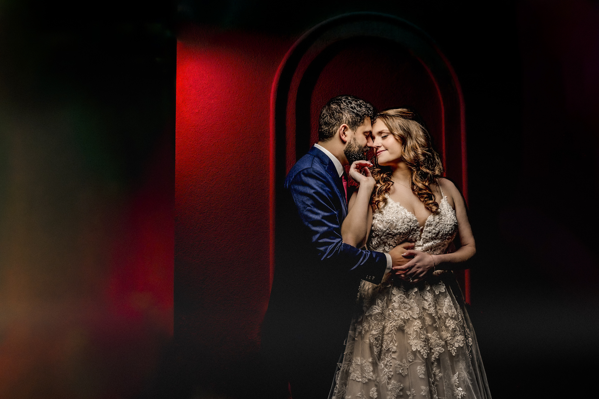 couple under colorful lights