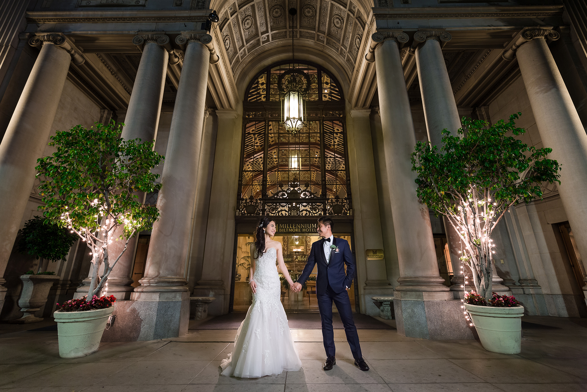 couple in front of hotel