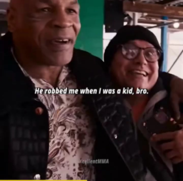 mike tyson runs into a man he robbed as a teenager.png