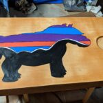 i made a lil sebastian patagonia corn hole board.jpeg