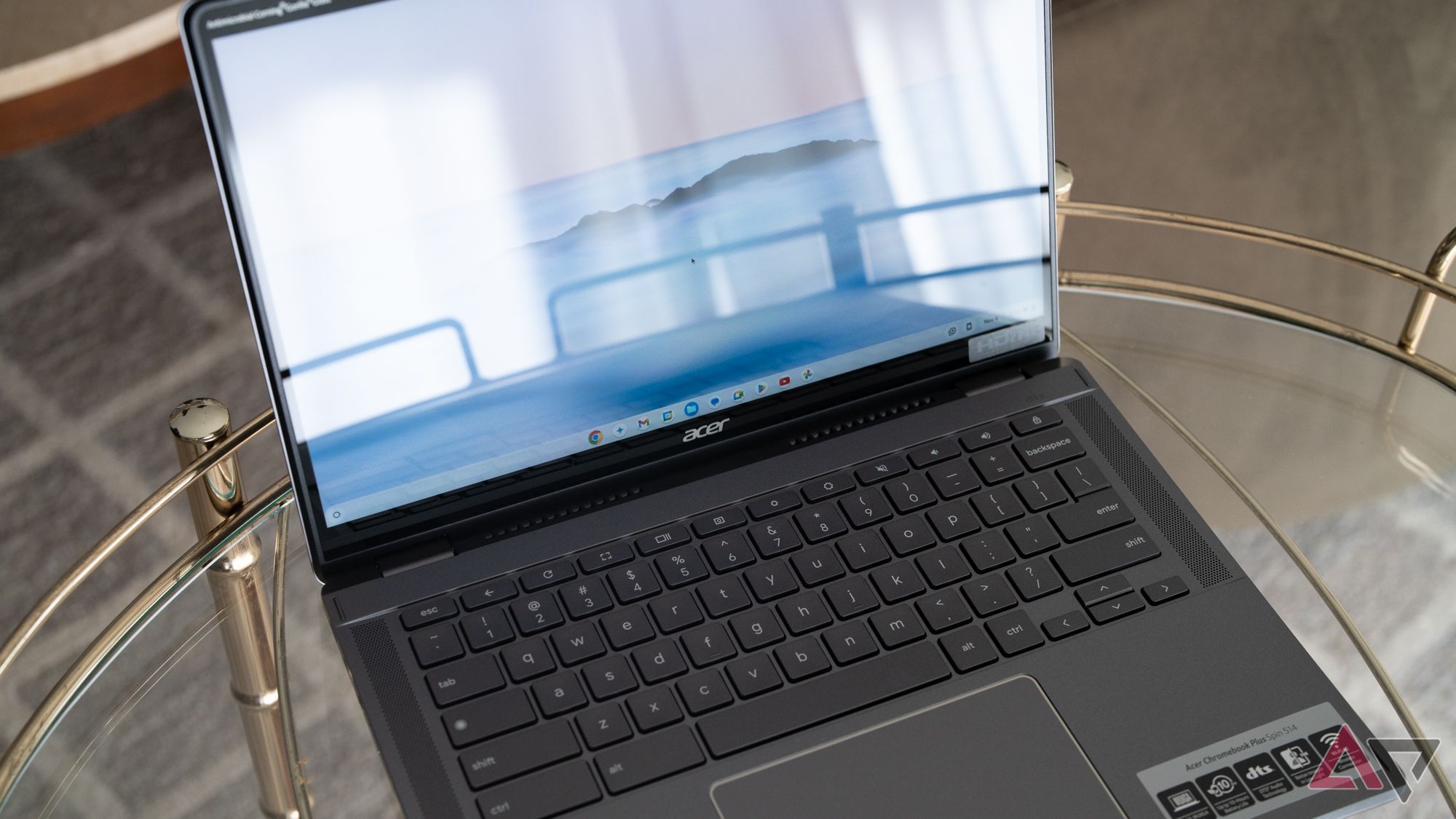 Acer Chromebook Plus Spin 514 open on a glass table, showing glare