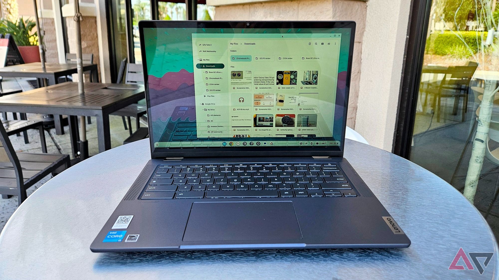 The Lenovo Chromebook Plus Flex 5i's Files app as the laptop sits at a froyo shop