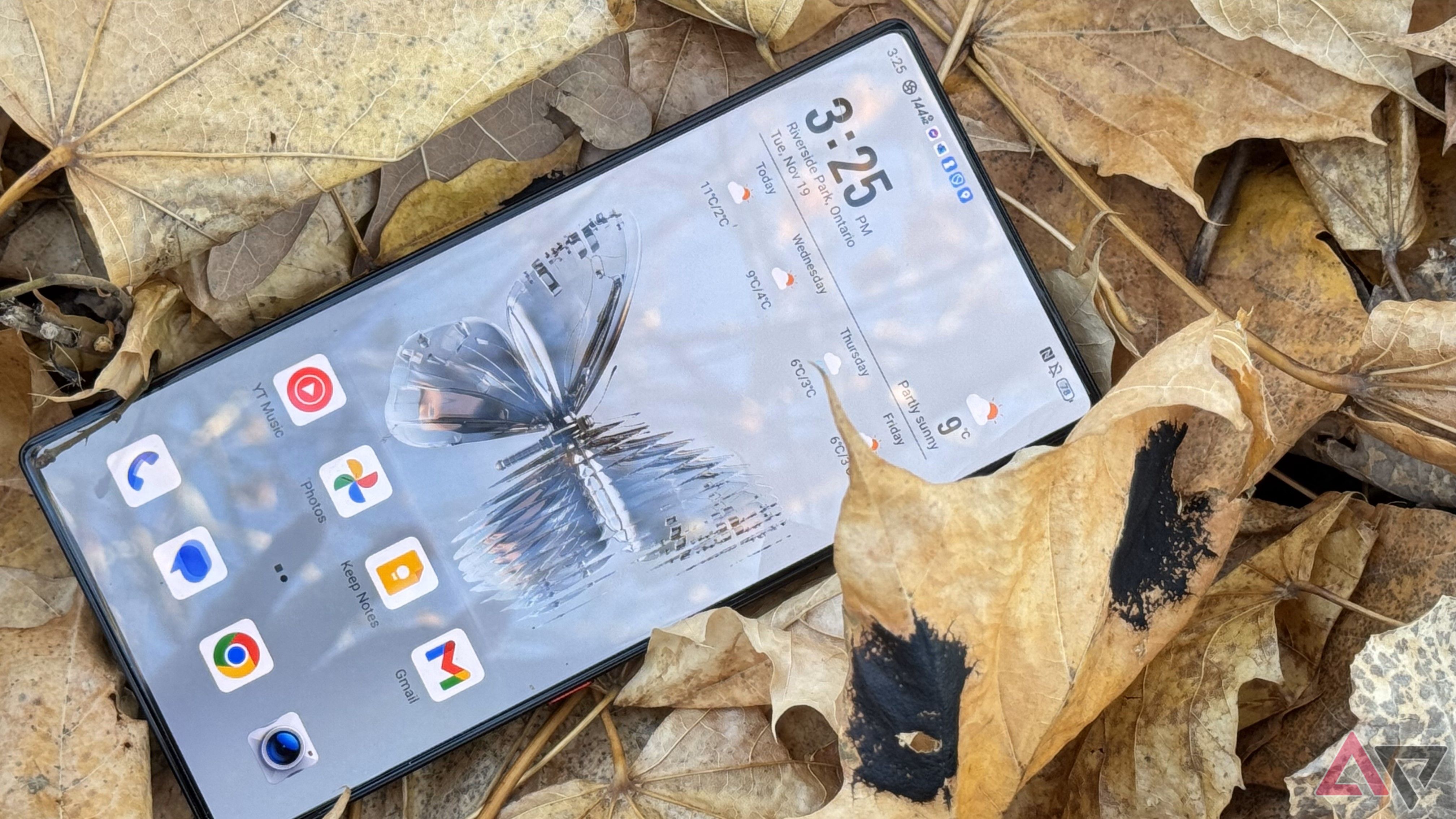 A Redmagic 10 Pro laying in a pile of brown leaves.