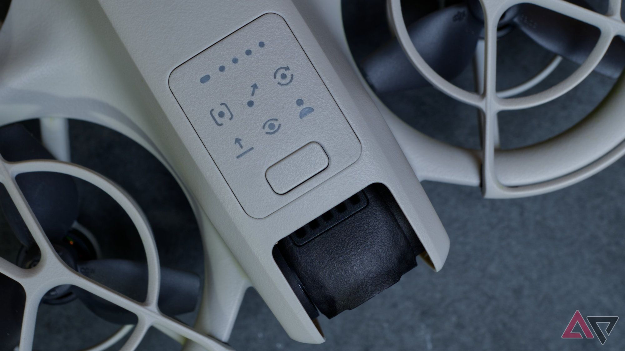 Close-up of the DJI Neo mode selection button and LEDs