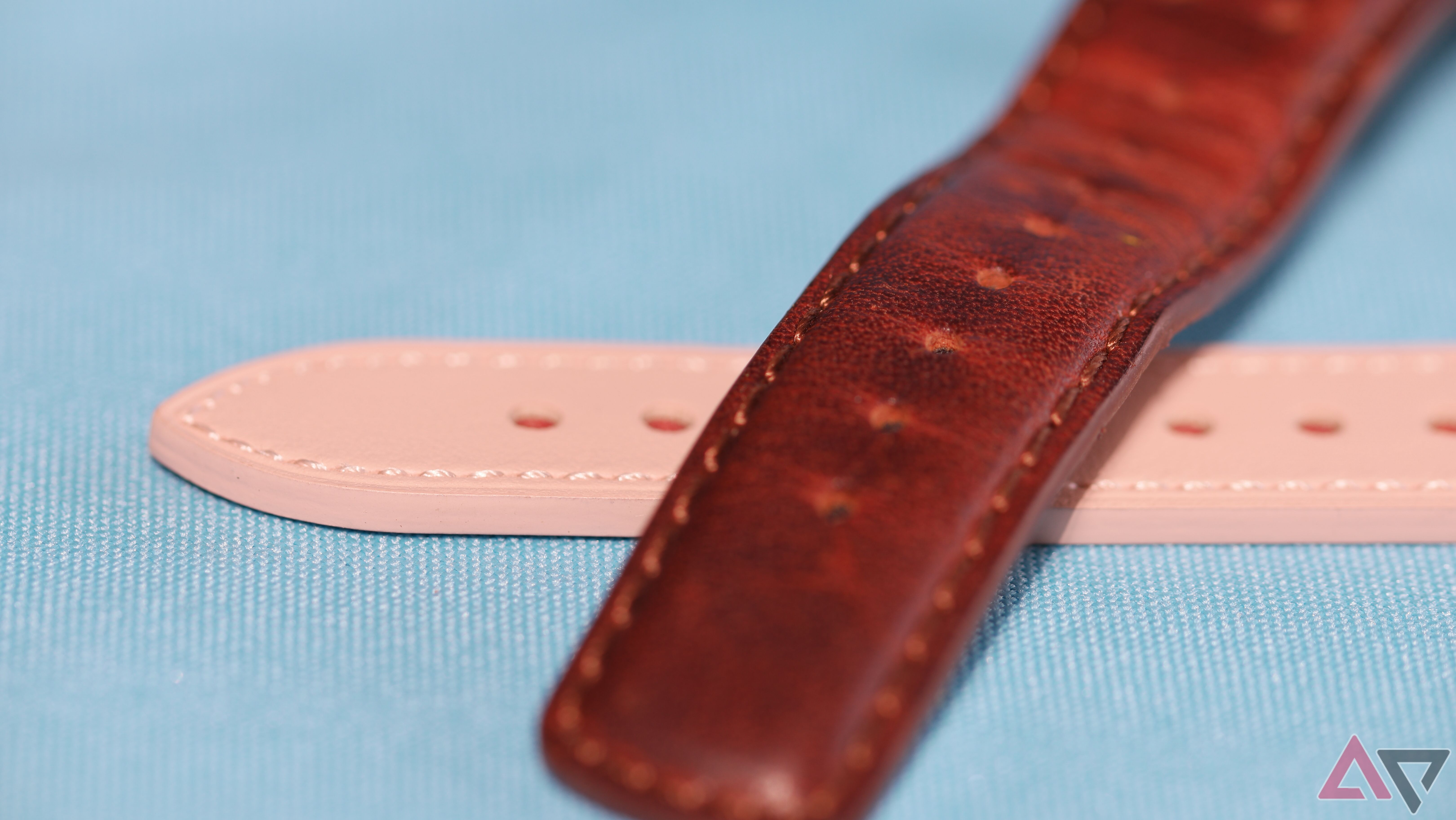 A brown Barton Horween Race strap on top of an Amazon generic pleather strap