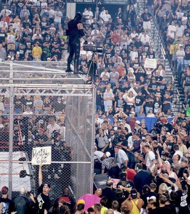 undertaker throws mankind off hell in a cell.jpeg