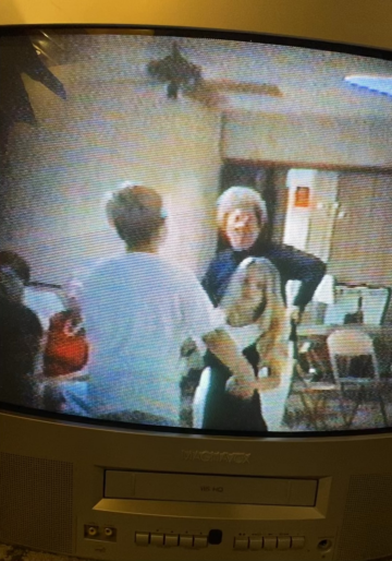 its 1996 and my dad is singing a willie nelson tune at an american legion in kansas.png