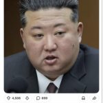 stuck a playing card in a tangerine.jpeg