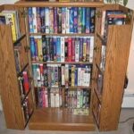 im pretty sure everyone at one time had a similar vhs cabinet.jpeg