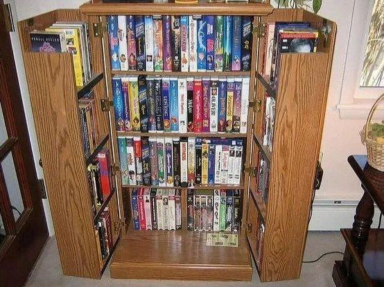im pretty sure everyone at one time had a similar vhs cabinet.jpeg