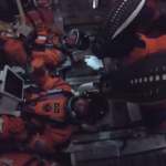 artemis ii astronaut entering a passcode to unlock his mission tablet.png