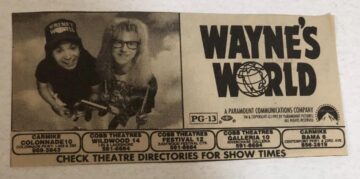newspaper movie ads with the theaters that are showing.jpeg