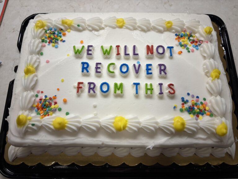 my coworkers last day was today brought him this cake.jpeg