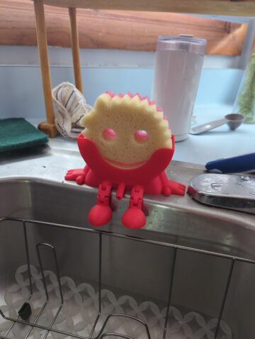 look at my cute little scrub mommy holder.jpeg