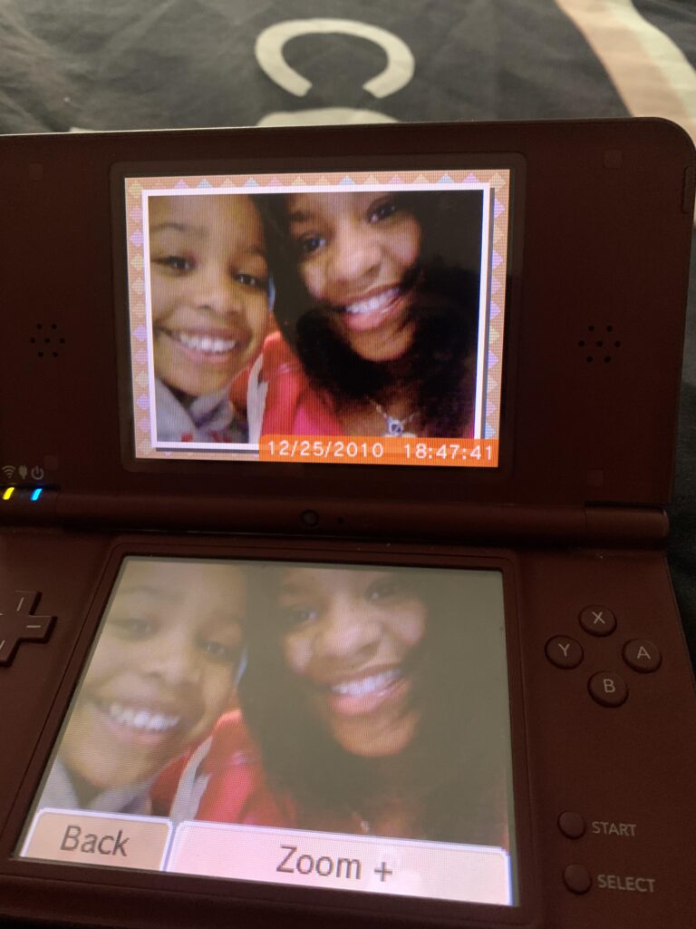 a pic with me and my sis from christmas 2010 on her nintendo dsi miss those times.jpeg