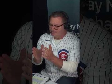 with ron swanson in the announcers booth a fielder named swanson makes a great catch dodgers game april 24 2026.jpeg