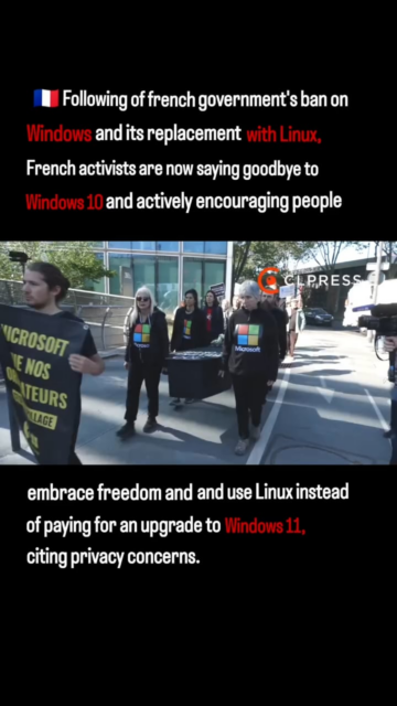 french activists parading fake windows coffin after switching to linux.png