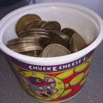 spending tokens at chuck e cheeses those were the days.jpeg