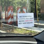 this sign at an intersection.jpeg
