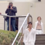 man accidentally walks runway at australia fashion week while heading for a swim.png