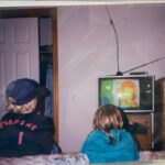 my brother and i in the 90s watching the simpsons.jpeg